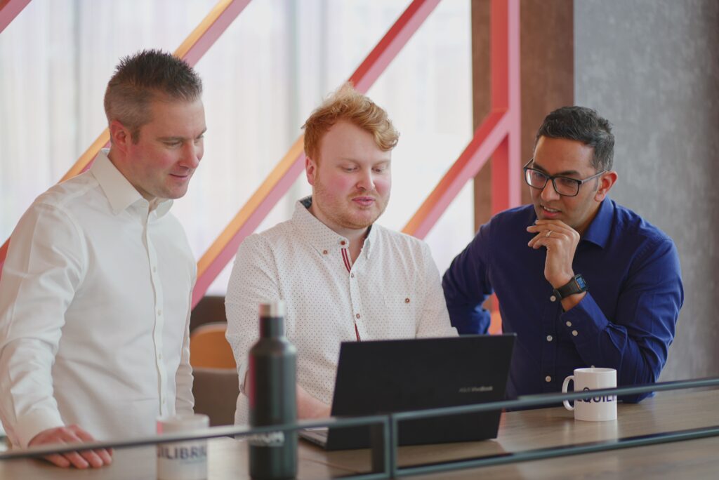 Equilibrium Security team collaborating attentively