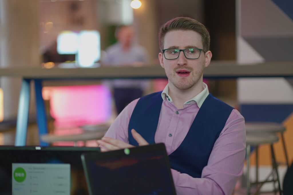 Businessman speaking in modern workspace